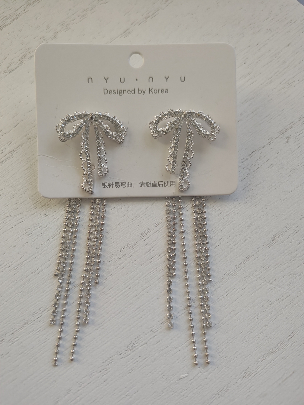 Silver Bow Drop Earrings with Chain Fringe